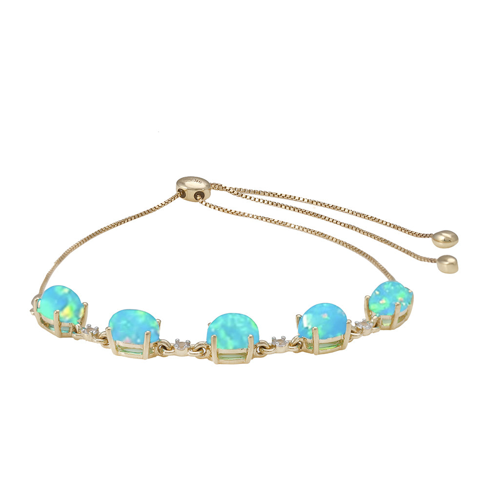 Pulsera de Oro 9K con Ópalo Azul Paraiba de Etiopía y Topacio Blanco