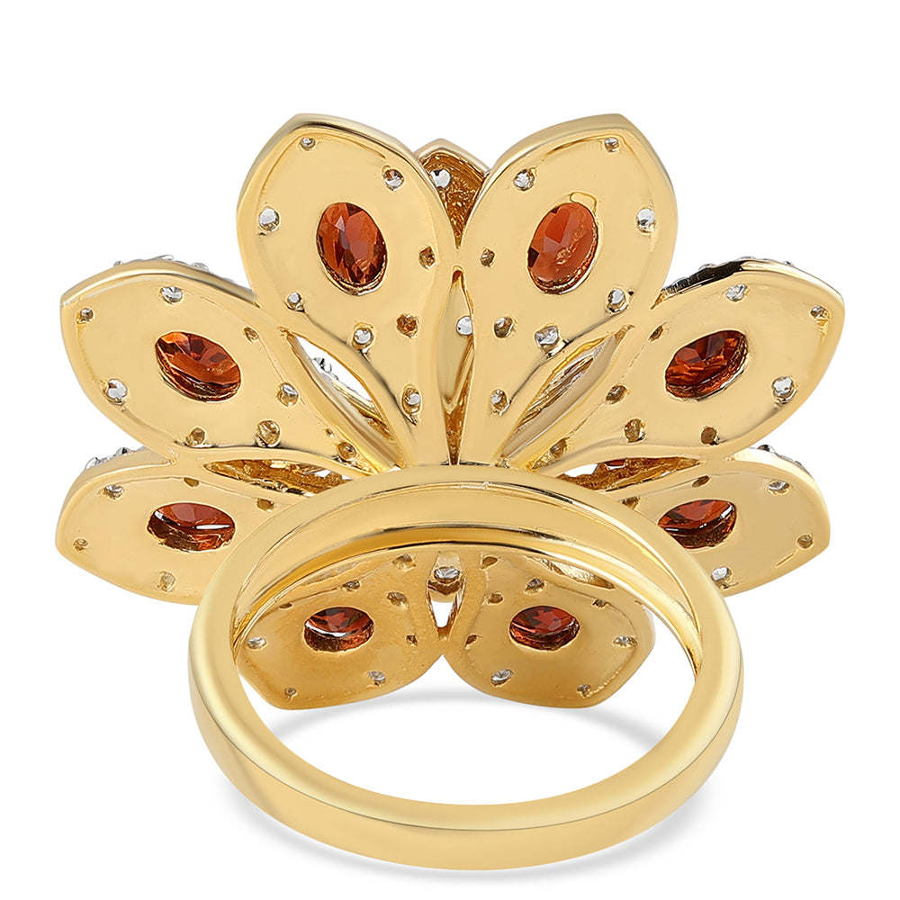 Anillo de Plata Bañada en Oro con Granate Barton y Topacio Blanco