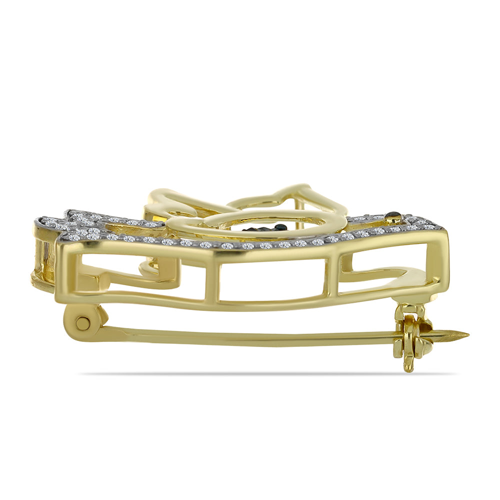 Broche de Plata Bañada en Oro con Diamante Azul y Topacio Blanco