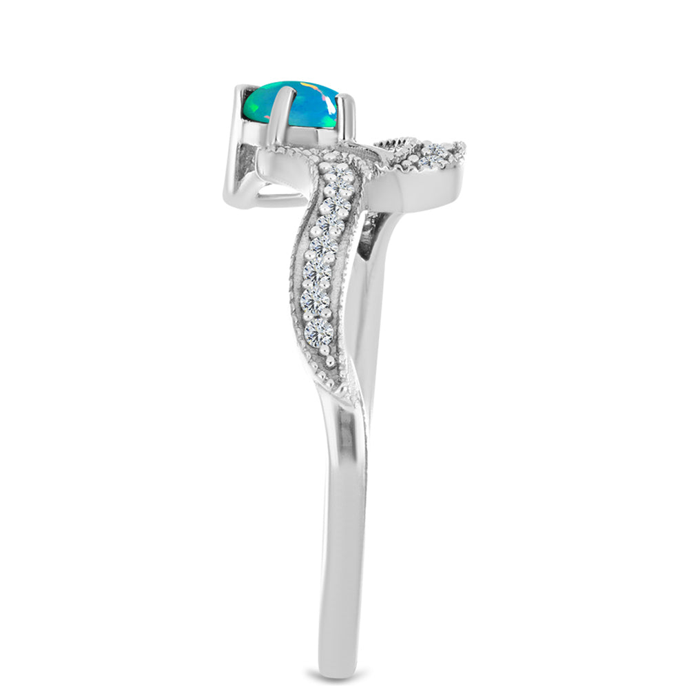 Anillo de Plata con Ópalo Azul de Lega Dembi de Etiopía y Zircón Blanco