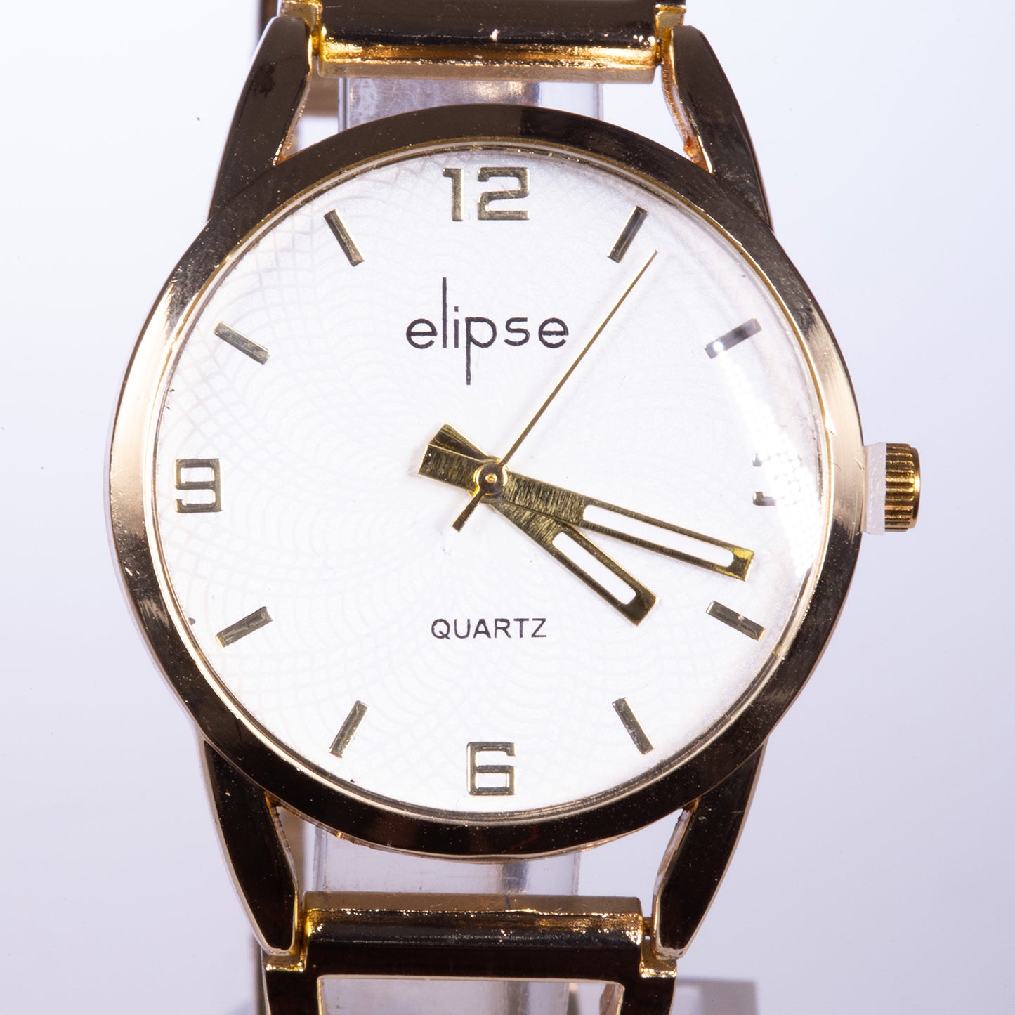 Reloj de moda para mujer con banda de acero, color dorado