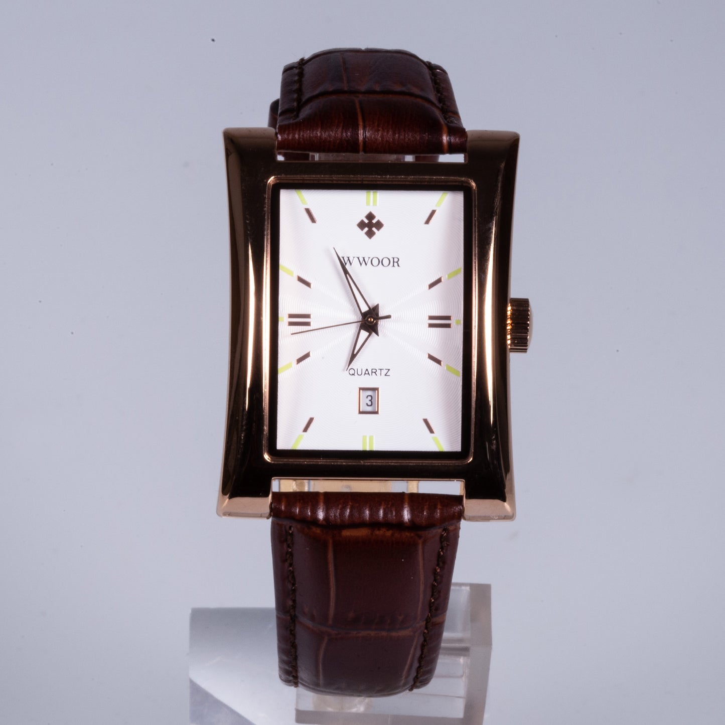 Reloj de pulsera de acero inoxidable chapado en oro con correa de cuero marrón