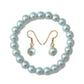 Conjunto de Plata Bañada en Oro con Perla de concha ( Pendientes +Pulsera )