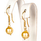 Conjunto de Plata Bañada en Oro con Perla de concha ( Pendientes +Pulsera )