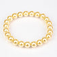 Conjunto de Plata Bañada en Oro con Perla de concha ( Pendientes +Pulsera )