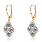 Pendientes de Plata Bañada en Oro con Diamante Azul y Diamante blanco