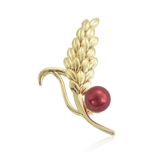 Broche de Plata Bañada en Oro con Perla roja de río