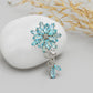 Broche de Plata con Apatita azul de Madagascar y Topacio Blanco