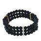 Pulsera de Plata Bañada en Oro con Ónix Negro y Topacio Blanco