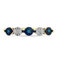 Anillo de Plata Bañada en Oro con Diamante Azul y Topacio Blanco