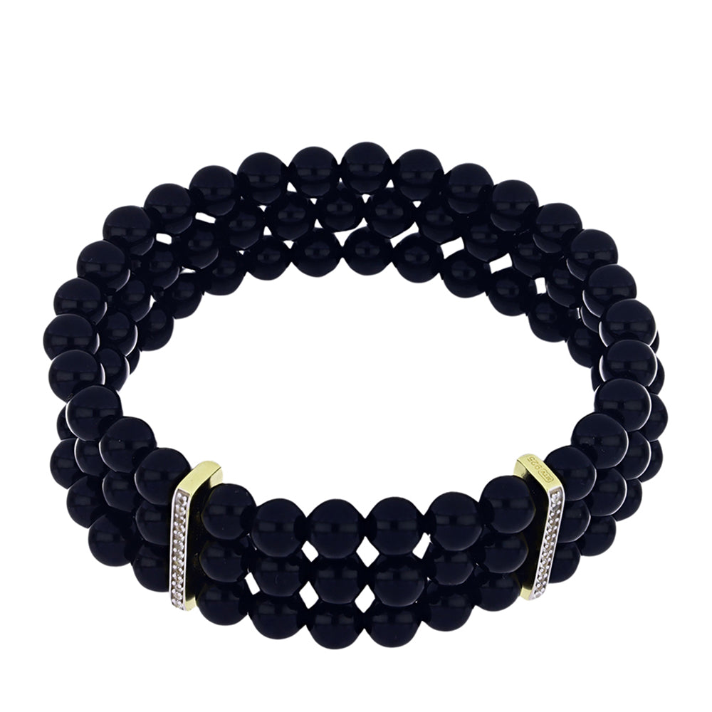 Pulsera de Plata Bañada en Oro con Ónix negro de Suwar y Topacio Blanco 1 