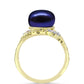 Anillo de Plata Bañada en Oro con Perla Negra de Agua dulce y Topacio Blanco