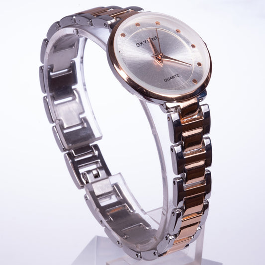 Reloj de moda para mujer con banda de acero, color dorado