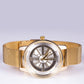 Reloj de moda para mujer con banda de acero, color dorado