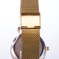 Reloj de moda para mujer con banda de acero, color dorado