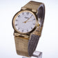 Reloj de moda para mujer con banda de acero, color dorado
