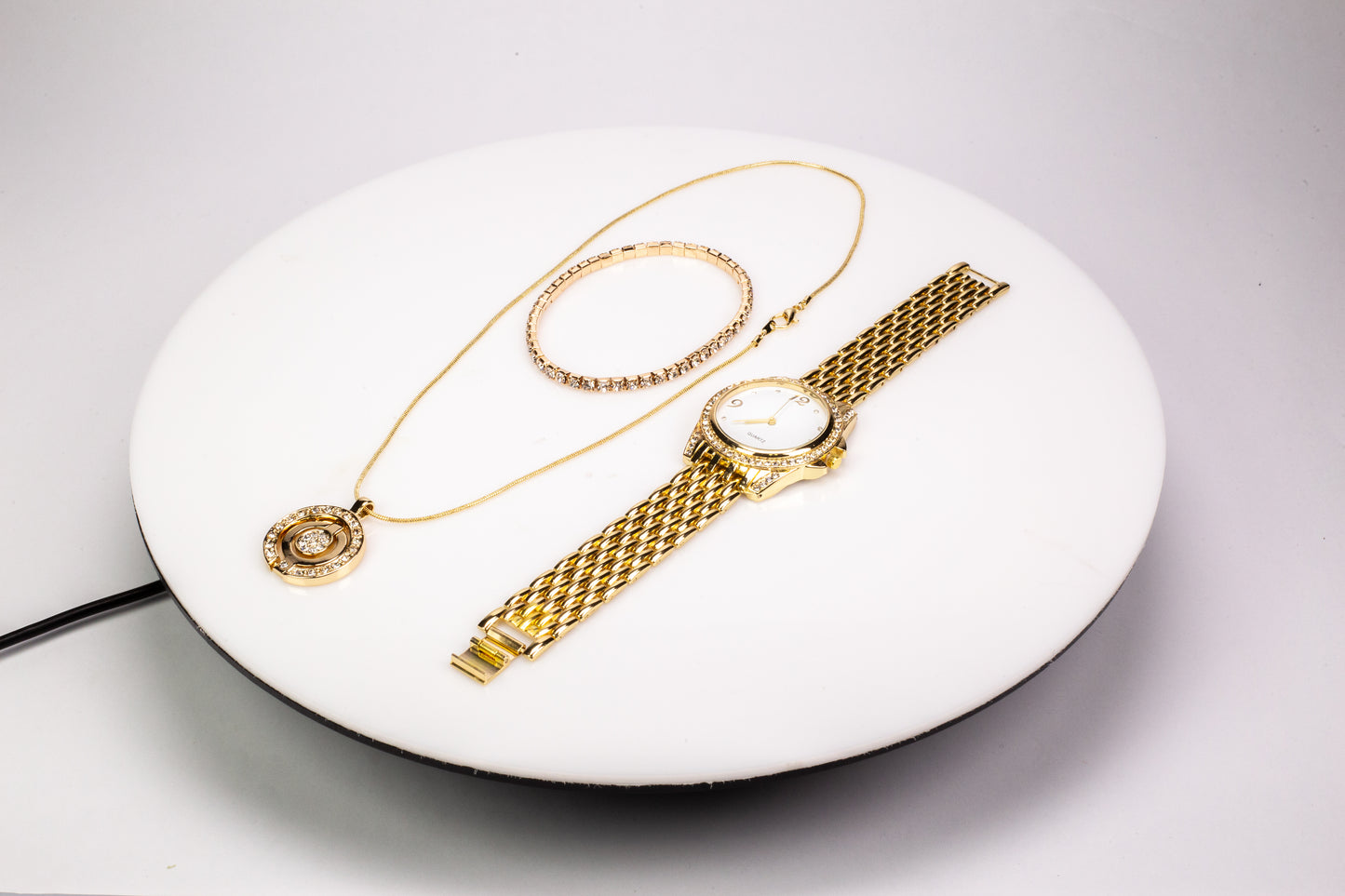 3 pieces Gold Plated Alloy Set of Quartz Watch (19 cm), stretchable Bracelet (21 cm) and pendant necklace (46 cm) with White Emporia Crystals, white dial
